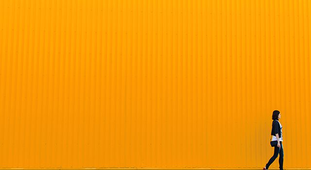 woman walking and considering fertility treatment